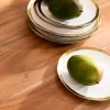 KARE24.se Tallrik Bell - Vit Porslin med guldkant, Ø25cm - KARE Design Sale